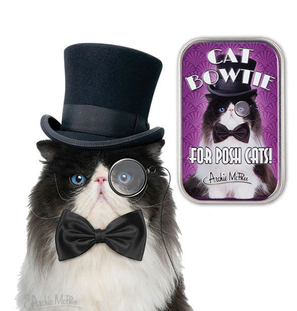 A long-haired black and white cat wearing a top hat, monocle, and bowtie poses next to a Cat Bowtie (For Posh Cats!) box by Archie McPhee