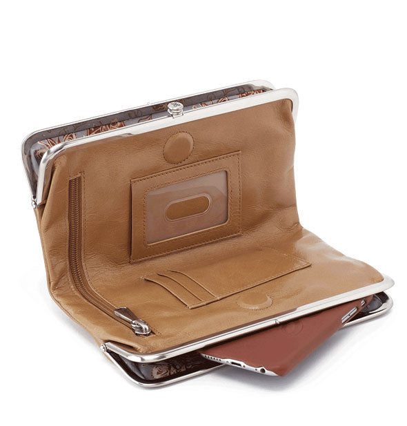 Open brown leather wallet with silver hardware