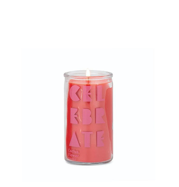 Small red wax candle in glass jar with pink lettering