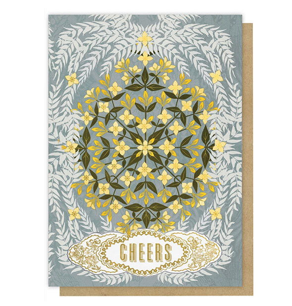 Blue-gray greeting card with intricate floral design says, "Cheers" at the bottom in gold lettering with ornate border