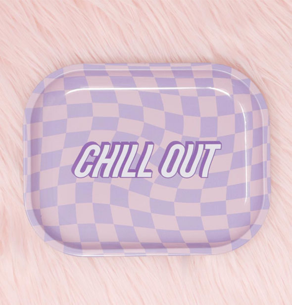 Rectangular pink and purple tray with rounded corners says, "Chill Out" in a wavy font