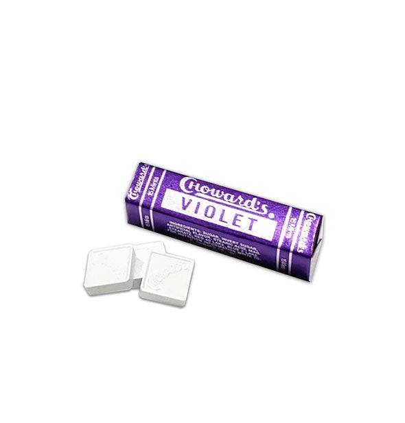 Purple pack of C Howard's Violet candy with three loose pieces in front