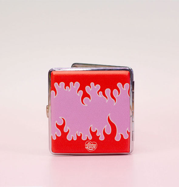 Back of pink and red flame cigarette case with heart-shaped logo that says, "Burning Love"
