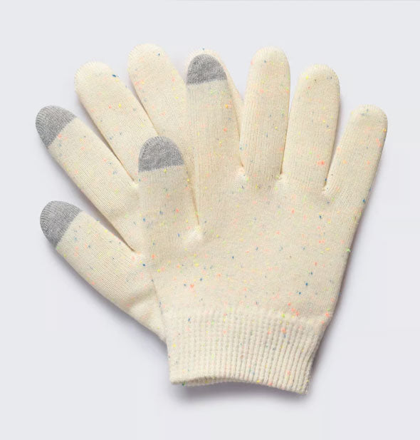 Pair of speckled cream-colored gloves with gray index finger and thumb tips