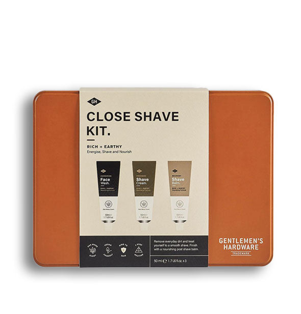 Orange rectangular Close Shave Kit tin with label