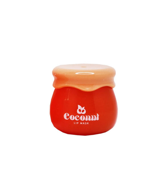 Reddish brown pot of Honey Lip Mask with shiny rubberized peach-colored lid lid