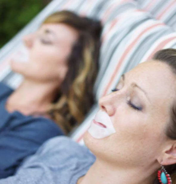 Models recline and relax on striped lounge chairs with ToGoSpa Lip Masks over their lips