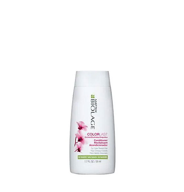 White 1.7-ounce travel size bottle of Matrix Biolage ColorLast Conditioner with pink floral design and green accents.