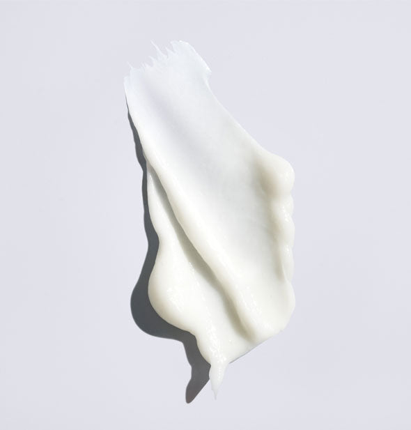 Sample of Oribe Conditioner for Brilliance & Shine shows product color and consistency