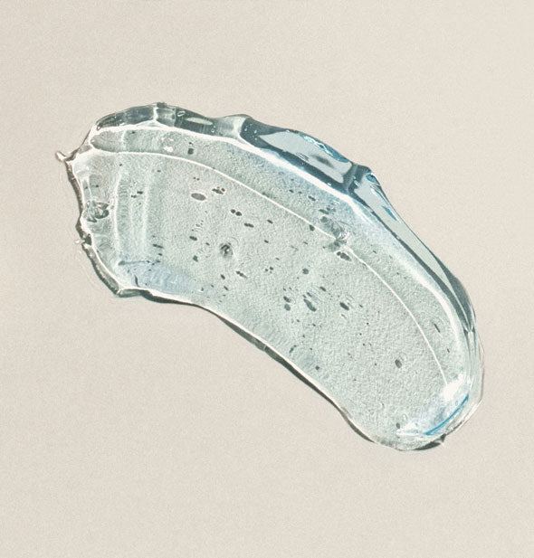 Sample application of Dermalogica Clear Start Cooling Aqua Jelly on a neutral surface shows product color and consistency