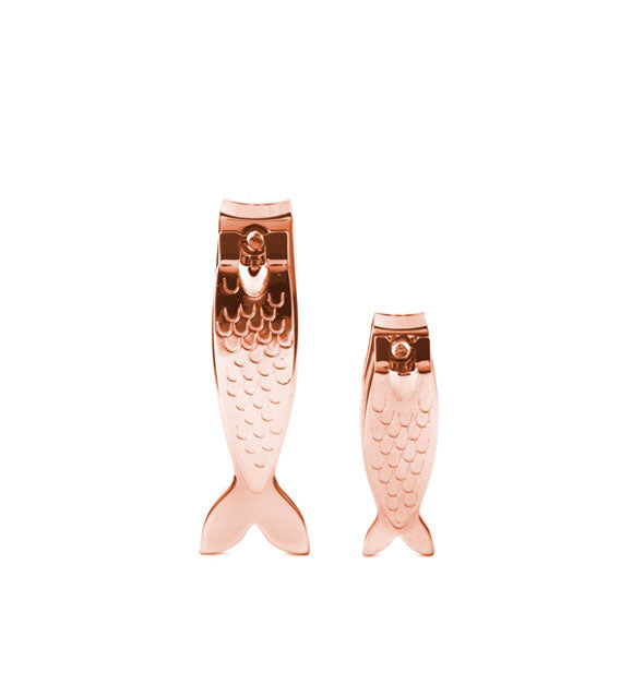One large and one small fish-shaped copper toenail clipper