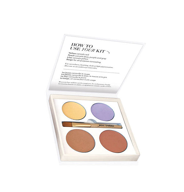 Square white color correcting makeup palette with yellow, violet, and two brown shades features instructions for use printed on the underside of its lid