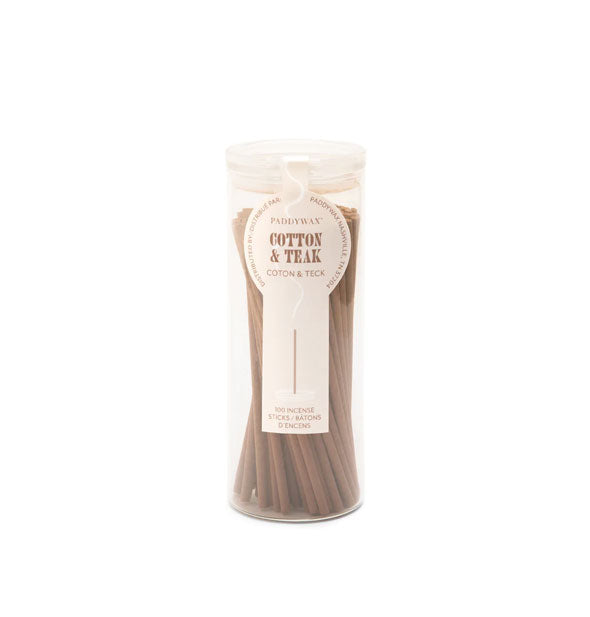 Whitish glass tube holds 100 sticks of Paddywax Cotton & Teak incense