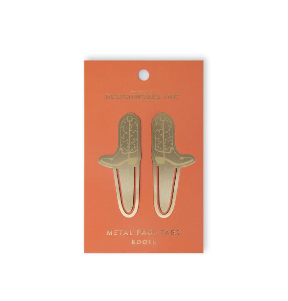 Gold metal page tabs featuring cowboy boot designs on an orange DesignWorks Ink product card