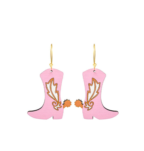Pink cowgirl boot earrings on gold hoops feature orange design flourishes and spurs