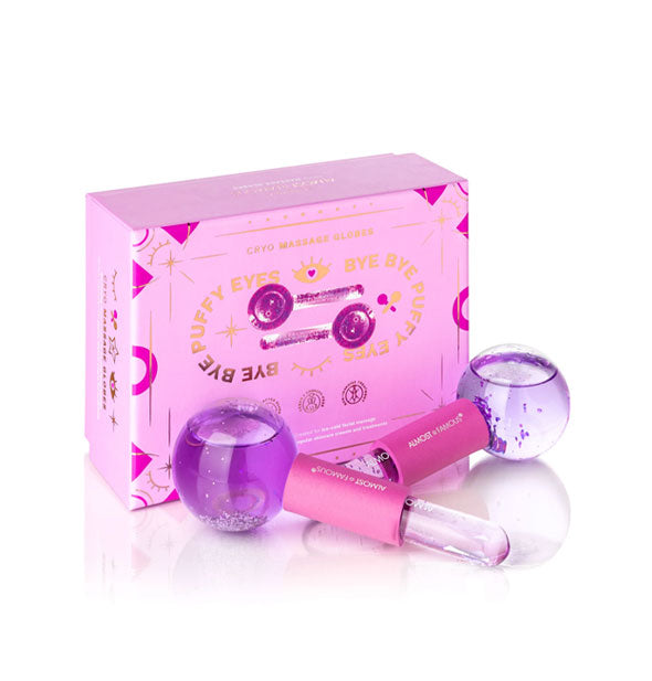Two pink and purple glitter Cryo Massage Globes by Almost Famous with box