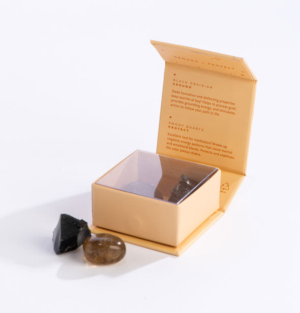 Open Crystal Magic box with raw black obsidian and polished smoky quartz