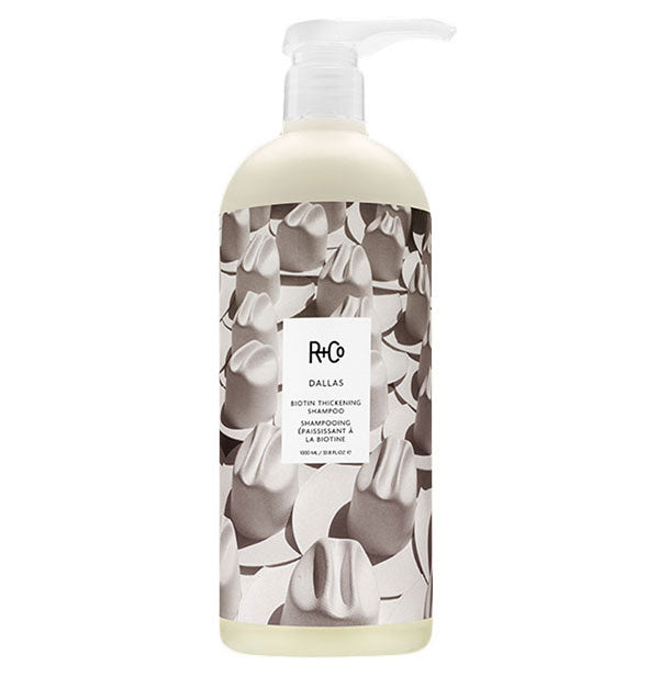 33.8 ounce bottle of R+Co Dallas Biotin Thickening Shampoo
