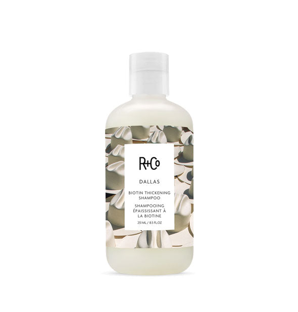 8.5 ounce bottle of R+Co Dallas Biotin Thickening Shampoo
