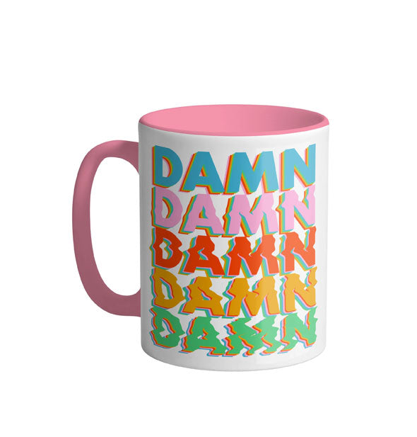 White coffee mug with pink handle and interior says, "Damn" five times in blue, pink, red, yellow, and green in increasingly distorted lettering from top to bottom