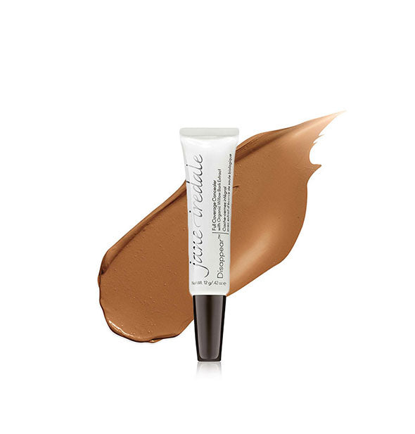 Tube of Jane Iredale Disappear Full Coverage Concealer with color swatch behind in the shade Dark