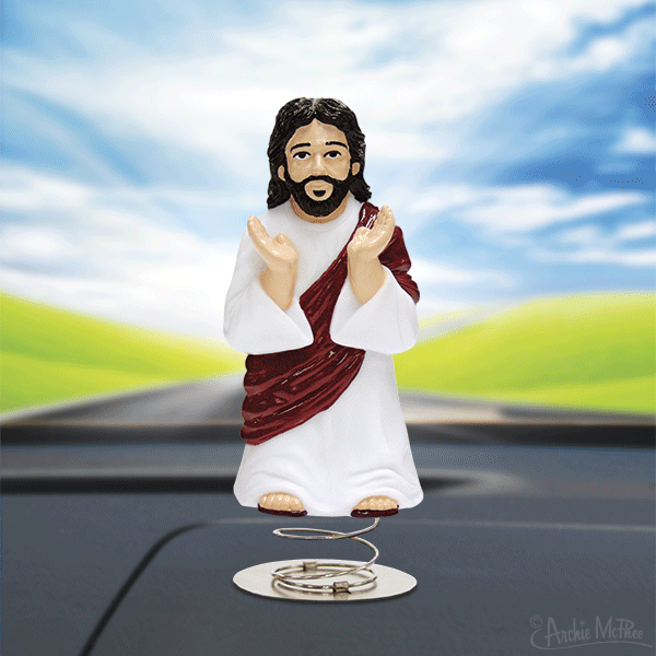 Bouncing Jesus figurine is shown on a simulated car dashboard