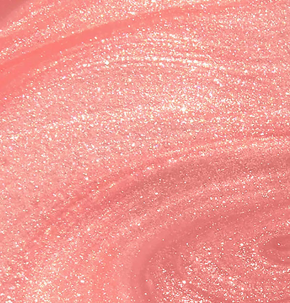 Closeup of shimmery peach nail polish