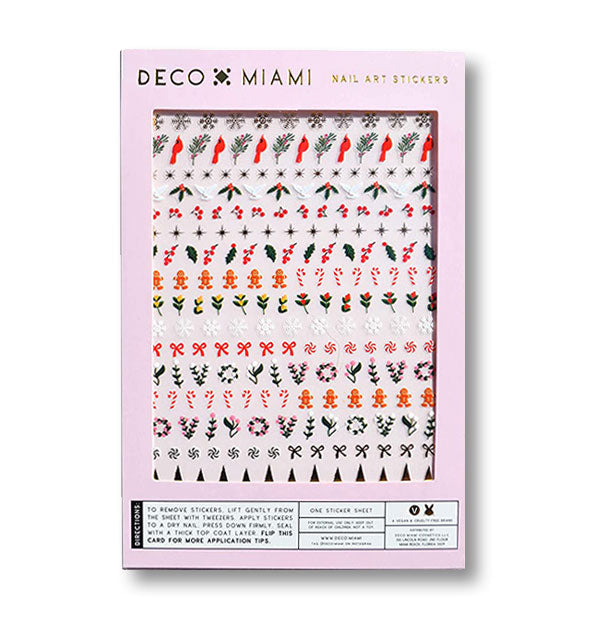 Pack of Deco Miami Nail Art Stickers with cardinals, holly berries, candy canes, gingerbread, and other holiday-themed designs shown