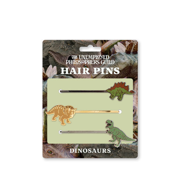 Set of 3 enamel and gold dinosaur hair pins by The Unemployed Philosophers Guild on illustrated product card