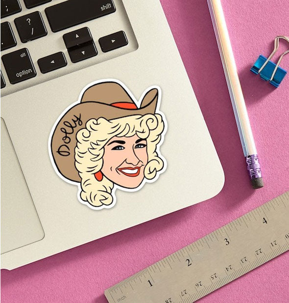 Dolly Parton cowgirl sticker on laptop