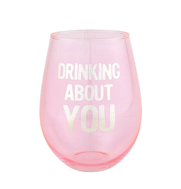 Pink stemless wine glass with silver "Drinking About You" lettering