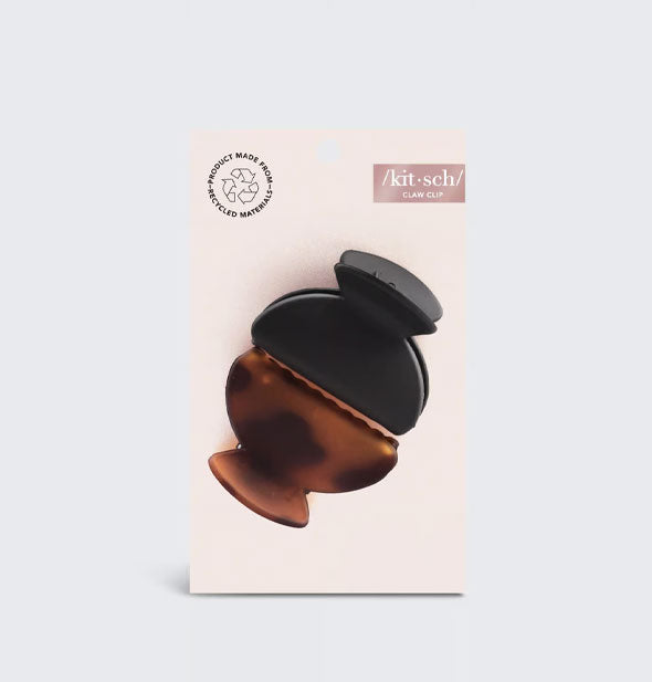 Two curved claw clips on a pink Kitsch product card, one black and the other brown tortoise