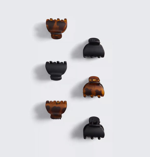 Three matte black and three matte brown tortoise mini hair claw clips