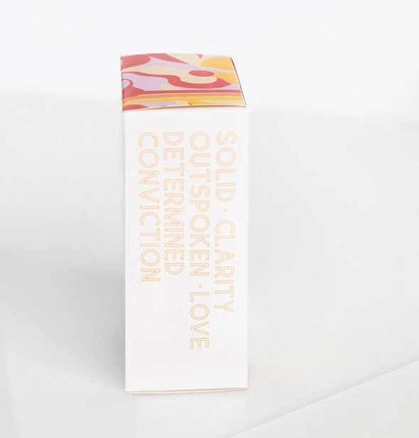 Infinite She Empowered eau de parfum box says, "Solid, clarity, outspoken, love, determined, conviction"