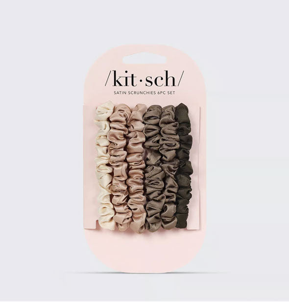 Pack of five ruched satin hair scrunchies in earthy neutrals on a pink Kitsch product card