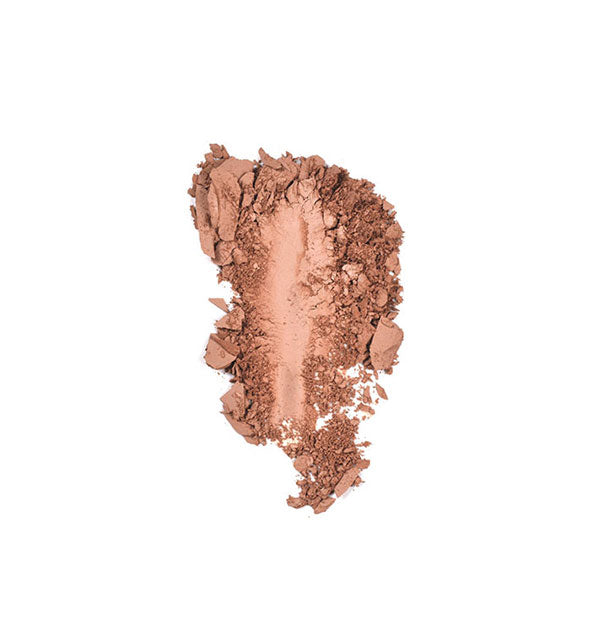 Crushed makeup powder in a pinkish-brown shade