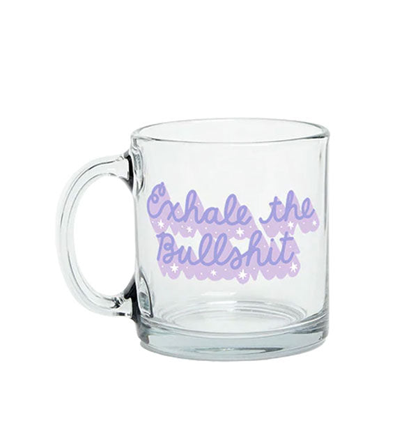 Clear glass mug says, "Exhale the Bullshit" in decorative purple script with white star accents