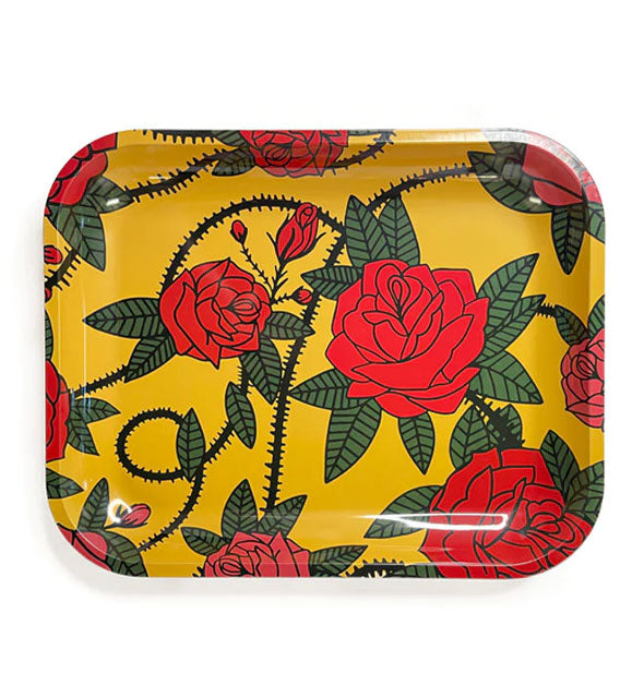 Rectangular yellow tray with rounded corners features an all-over brightly-colored red thorny roses design