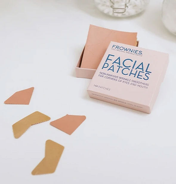 Frownies Facial Patches box with some contents removed to show shapes and sizes
