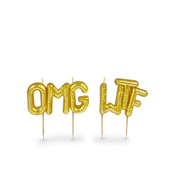 Gold birthday cake candles resembling mylar balloons spell out, "OMG WTF"