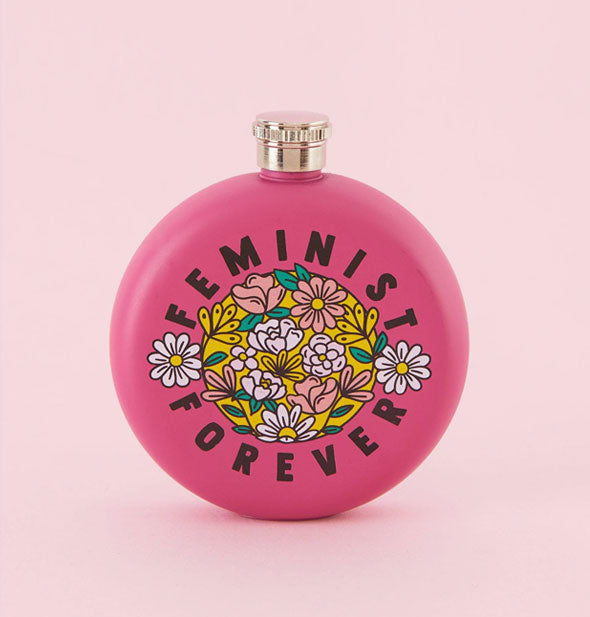Round pink flask with central floral illustrations says, "Feminist Forever" in black lettering