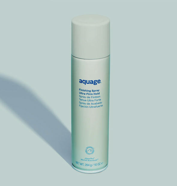 Green can of Aquage Finishing Spray on a backdrop of the same color casts a long shadow