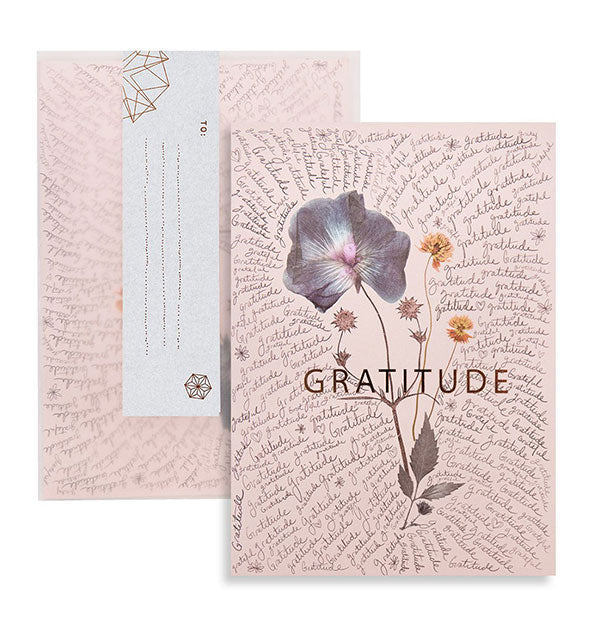 Muted pink greeting card with intricate florals and all-over script says, "Gratitude" in the cender