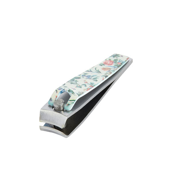 Closeup of floral-patterned stainless steel fingernail clippers