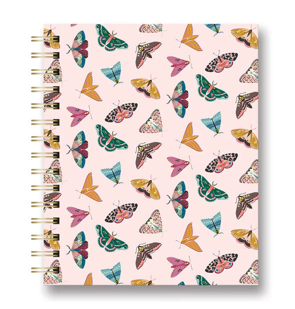 Blush pink notebook with twin ring spiral binding features all-over cover design of colorful floral moths