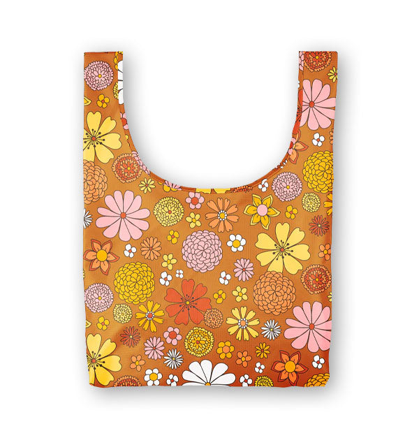 Medium brown tote bag with all-over retro-style flower illustrations in orange, pink, yellow, and white