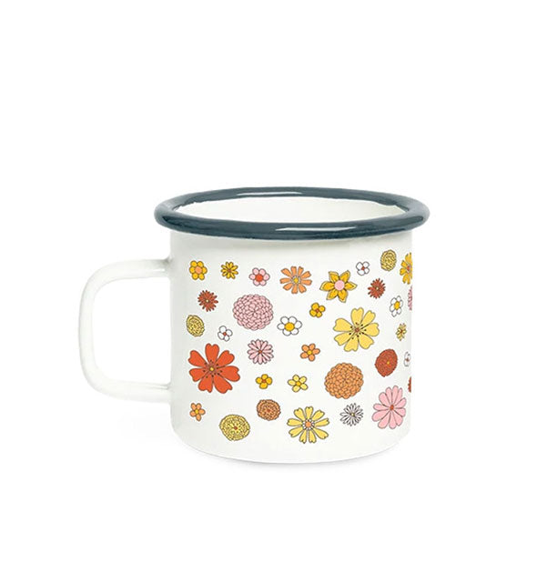 White campfire-style mug with dark rim has all-over orange, pink, red, and yellow flower designs