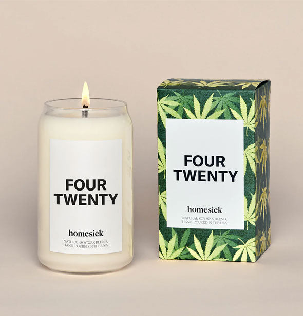Lit "Four Twenty" candle by Homesick with minimalist black and white label next to box featuring a green pot leaf pattern