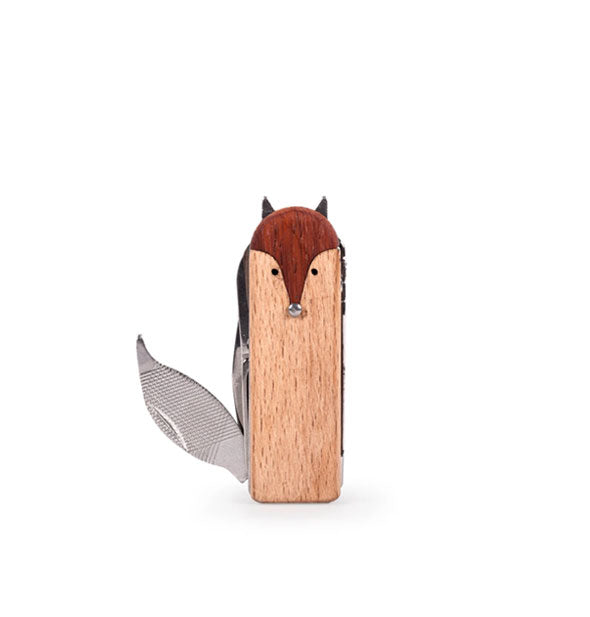 Wooden fox nail care tool with file extended