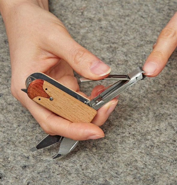 Model demonstrates use of the Fox Manicure Tool